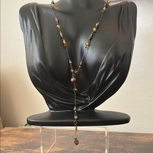 Elegant Beaded Necklace with Brown and Gold Accents